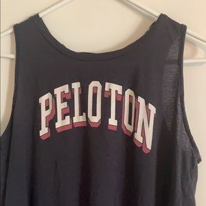 Peloton sleeveless t-shirt. Ties at back
